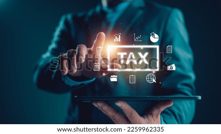 E-tax, Businessman show TAX for Individual income tax return form online for tax payment concept. Government, state taxes. Data analysis, paperwork, financial research, report. Calculation tax return. Royalty-Free Stock Photo #2259962335