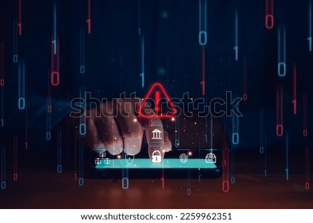 user is using smartphone with triangle caution warning sign for notification error and maintenance concept. hacker attacks and hacking data, cyber crime, cyber security, Ransomware, Phishing, Spyware. Royalty-Free Stock Photo #2259962351
