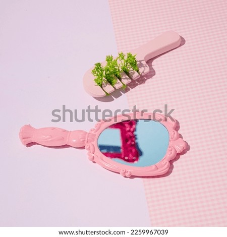 Handheld makeup and beauty mirror and hair comb decorated with bright green moss, retro aesthetic, romantic, girly layout. 