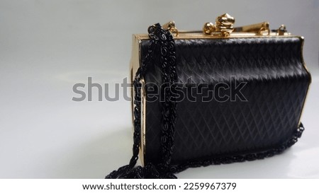 Elegant black bag with chain strap