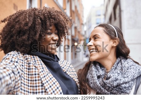 Selfie, travel and laughing in the city with a woman friends outdoor for tourism or adventure overseas. Photograph, tourist or laughter with a happy female and friend joking in an urban town