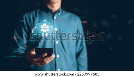 Cloud printing concept.Business man using smartphone for print cloud computing Royalty-Free Stock Photo #2259997683