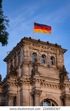 The German flag over Reichstag Building in Berlin