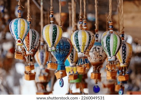 Turkish souvenirs in the form of balloons. Cappadocia. Turkey Royalty-Free Stock Photo #2260049531