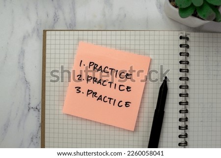 Concept of Practice, Practice, Practice write on sticky notes isolated on Wooden Table. Royalty-Free Stock Photo #2260058041