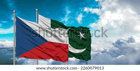 Flags of Pakistan and Czech Republic friendship flag waving on the sky with beautiful sun light.