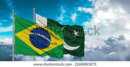 Flags of Pakistan and Brazil friendship flag waving on the sky with beautiful sun light.