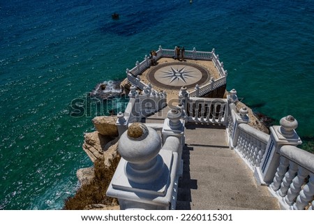 beautiful white viewpoint in the old town of Benidorm Spain against the blue sea on a summer day Royalty-Free Stock Photo #2260115301