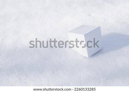 craft white square boxes on snow. High quality photo