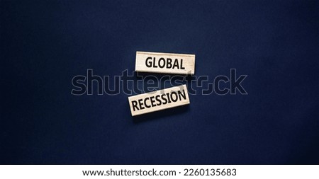 Global recession symbol. Concept words Global recession on wooden blocks. Beautiful black table black background. Business and global recession concept. Copy space.
