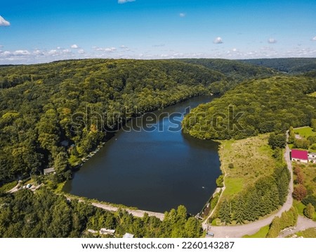 Aerial vIew of Lake Barvinok, city Novyy Rozdil by drone. Summer Ukraine Lviv region, West Ukraine.