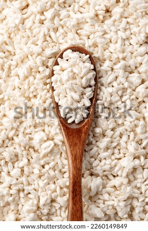 Close-up of rice koji and wooden spoon. Koji. Koji is fermented rice. A view from directly above. Royalty-Free Stock Photo #2260149849