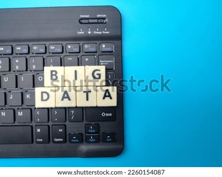 Toys word and keyboard with the word BIG DATA. Business concept.