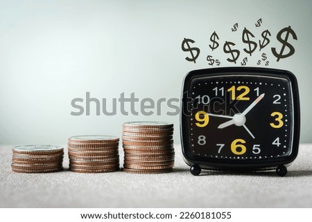Alarm Clock with coin money with dollar icon, Time Saving concept, with Space for your Text. 