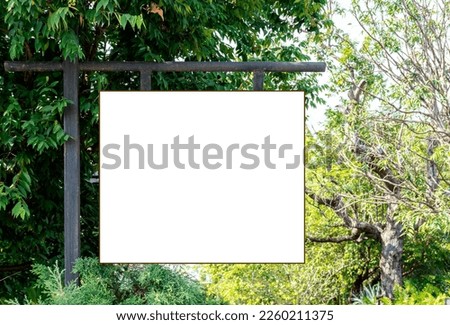 Outdoor white sign with natural background 