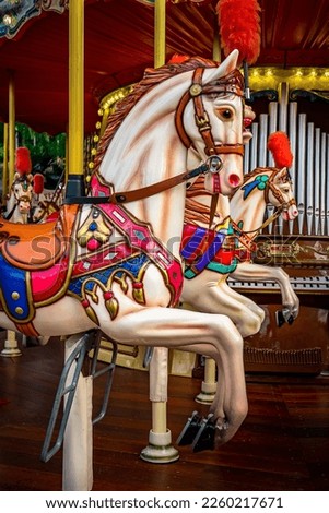 Horses of Merry-Go-Round at Carnival.