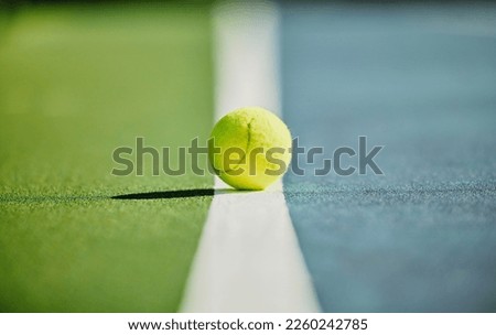 Tennis ball, court and green texture of line between grass and turf game with no people. Sports, empty sport training ground and object zoom for workout, exercise and fitness for a match outdoor Royalty-Free Stock Photo #2260242785