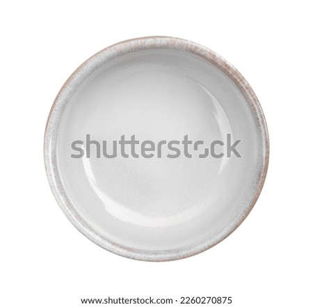 New ceramic bowl on white background, top view Royalty-Free Stock Photo #2260270875