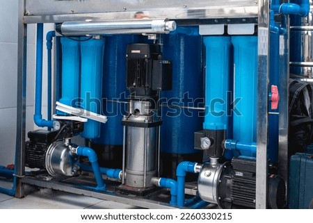 A reverse osmosis water station for a water refilling business. Royalty-Free Stock Photo #2260330215
