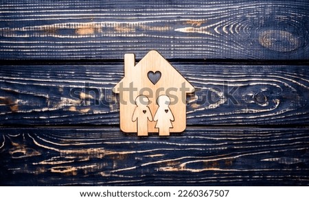  Symbol of home and family on a brown background
