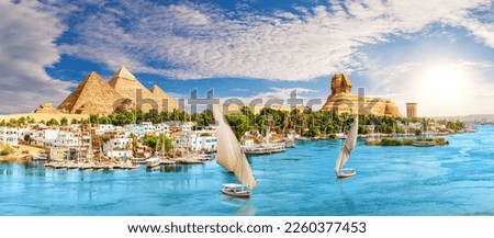 Skyline panorama of Aswan city on the way to the Great Sphinx and Pyramids of Egypt Royalty-Free Stock Photo #2260377453