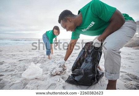 Friends, cleaning and recycling with people on beach for sustainability, environment and eco friendly. Climate change, earth day and nature with volunteer for community service, pollution and plastic Royalty-Free Stock Photo #2260382623