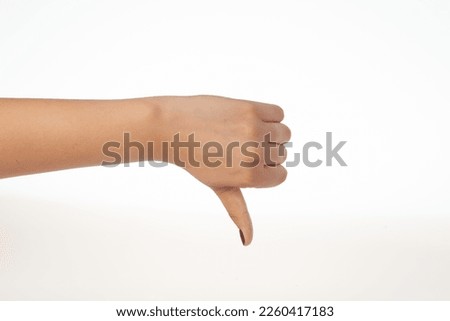 Hand  making negative sign isolated on white background