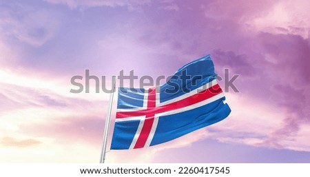 Iceland national flag waving in the sky.