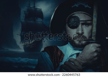 Serious, man pirate with eye patch and old hat with funny faces and expressive