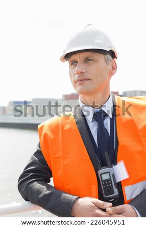 Middle-aged male worker in shipping yard