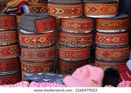 A souvenir shop selling souvenirs memorabilia of traditional hat cap of Himalayas in Mall road Manali Shimla Himachal Pradesh India. Royalty-Free Stock Photo #2260479023