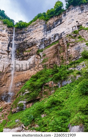Georgia.Kinchkha waterfall.Sheer rock.Water falling from a great height.