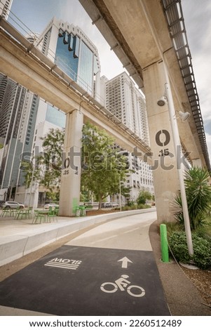 Underline Miami walking and biking path under the Miami Metrorail tram tracks Royalty-Free Stock Photo #2260512489