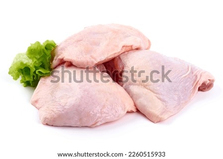 Raw chicken leg quarters, isolated on white background. High resolution image Royalty-Free Stock Photo #2260515933