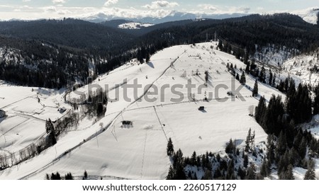 Beautiful view of the mountains. Ski resort on a frosty day. mountains Carpathians, Ukraine. Great winter wallpaper.