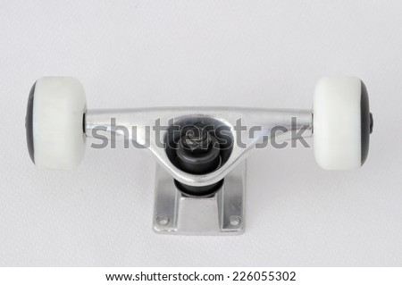 New Skateboard Parts on a White Background, Truck and Wheels