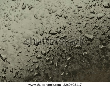raindrops close up on surface