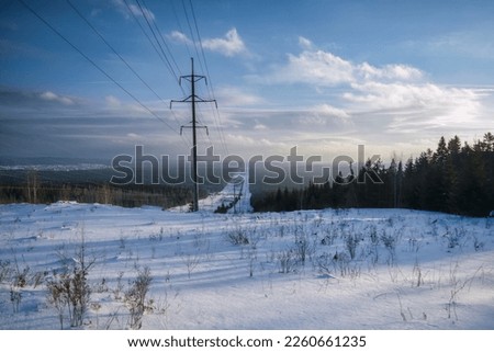 Beautiful winter landscape. winter mountain forest. frosty trees under a hot sun. scenic natural landscapes. creative artistic image. natural background. winter holiday background.