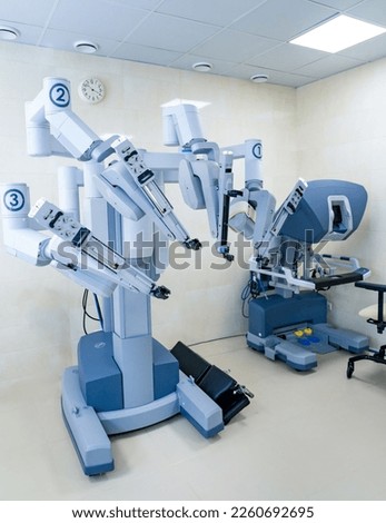 Modern robot for surgery procedure. Da vinci robot in hospital ward. Royalty-Free Stock Photo #2260692695