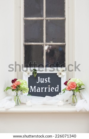 Just Married Chalkboard Sign in Church Window