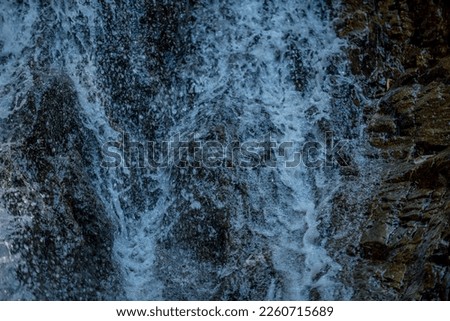 Deep forest waterfall background image.