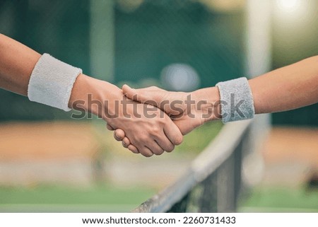 Hand, tennis and handshake for partnership, unity or greeting in sportsmanship at the outdoor court. Players shaking hands before sports game, match or trust for deal or agreement in solidarity Royalty-Free Stock Photo #2260731433