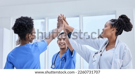 Success, high five and teamwork with doctors in hospital cheering for celebration, support or goal. Medical, healthcare and medicine with group of people and gesture for achievement, target or winner