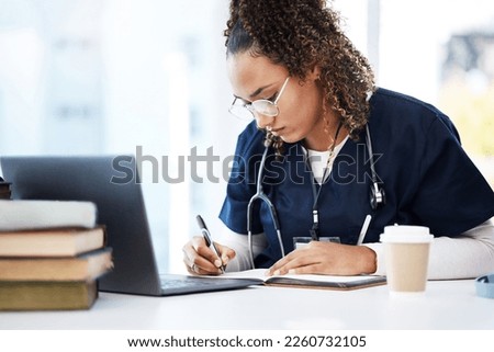 Medical student, thinking or writing books in research education, wellness studying or hospital learning. Laptop, nurse or healthcare woman and notebook, technology or scholarship medicine internship Royalty-Free Stock Photo #2260732105