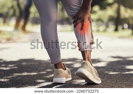 Woman, fitness and pain or injury on legs while running on outdoor road for exercise, workout and training. Sport person with red anatomy calf overlay for and massage for joint, accident or arthritis Royalty-Free Stock Photo #2260732275