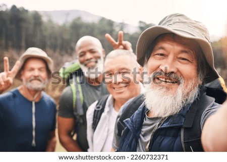 Hiking, selfie and friends portrait with peace sign while taking pictures for happy memory in nature. V gesture, face exercise and group of senior men take photo for social media after trekking hike.