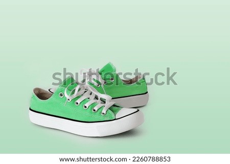 cool youth green gym shoes. Athletic shoes. fitness, sport, training concept. Urban fashion. Copy space for ad, text, design. High quality photo