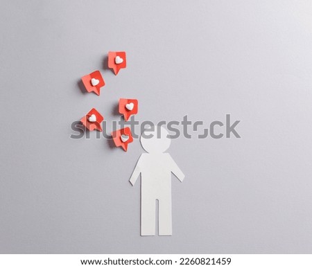 Paper cut man with Social media likes on gray background. Creative minimal layout