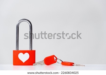 Happy Valentine's Day - Love Lock and Red Keys on White Background, place for text.