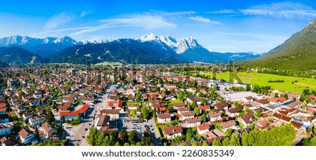 Garmisch-partenkirchen and Zugspitze mountain aerial panoramic view. Garmisch Partenkirchen is an Alpine ski town in Bavaria, southern Germany. Royalty-Free Stock Photo #2260835349